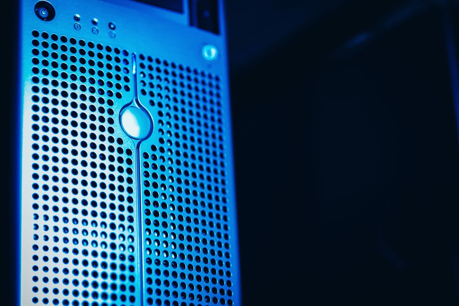 Blue-lit server racks inside a modern data center.